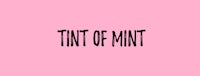 the word tint of mint on a pink background