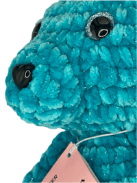 a blue teddy bear with a tag on it